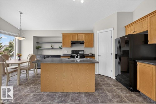 7928 10 Avenue, Edmonton, AB - Indoor Photo Showing Kitchen With Double Sink