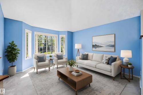 Living area featuring a bay window with multiple panes, providing abundant natural light - 15016 134 Street, Edmonton, AB 