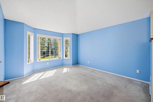 Bay window with multiple panes and white trim - 15016 134 Street, Edmonton, AB 
