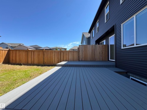 Multi-level composite deck with a dark gray finish - 7432 Elmer Road, Edmonton, AB 