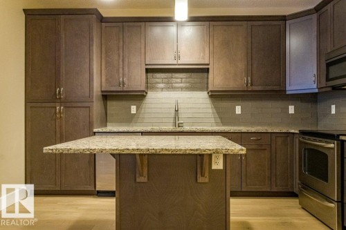 149 6079 Maynard Way Nw, Edmonton, AB - Indoor Photo Showing Kitchen With Upgraded Kitchen