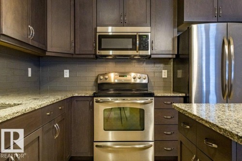 149 6079 Maynard Way Nw, Edmonton, AB - Indoor Photo Showing Kitchen With Upgraded Kitchen