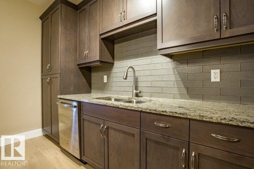 149 6079 Maynard Way Nw, Edmonton, AB - Indoor Photo Showing Kitchen With Double Sink