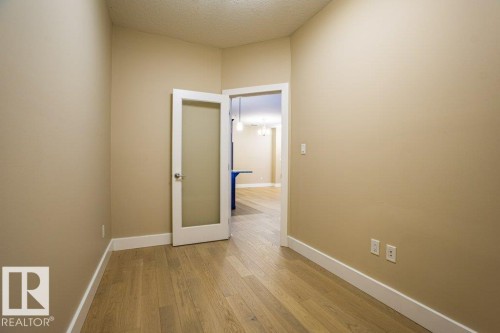 149 6079 Maynard Way Nw, Edmonton, AB - Indoor Photo Showing Other Room