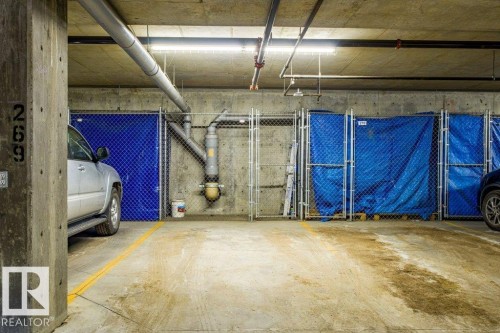 149 6079 Maynard Way Nw, Edmonton, AB - Indoor Photo Showing Garage