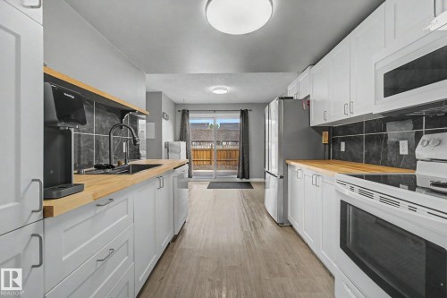4315 46 Street, Stony Plain, AB - Indoor Photo Showing Kitchen With Double Sink