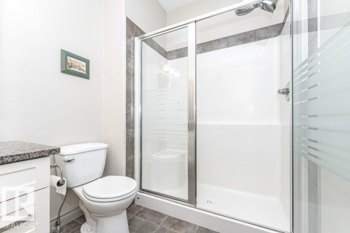 Walk-in shower with frosted glass enclosure - 15 175 Mcconachie Drive, Edmonton, AB 