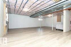 Spacious unfinished basement offering extensive possibilities - 