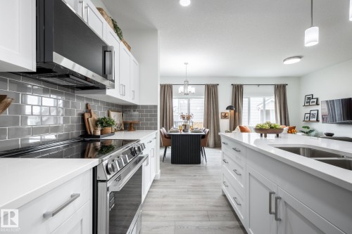 13 Patriot Way, Spruce Grove, AB - Indoor Photo Showing Kitchen With Double Sink With Upgraded Kitchen