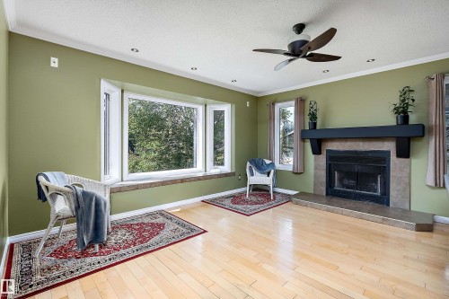 5609 58 Street, Beaumont, AB - Indoor Photo Showing Living Room With Fireplace