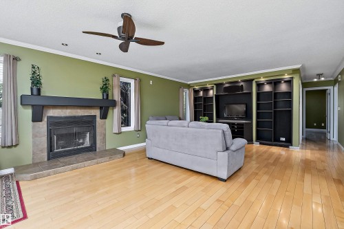 5609 58 Street, Beaumont, AB - Indoor Photo Showing Living Room With Fireplace