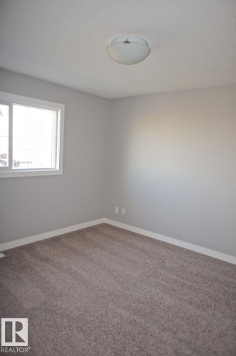 180 Radcliffe Wynd, Fort Saskatchewan, AB - Indoor Photo Showing Other Room