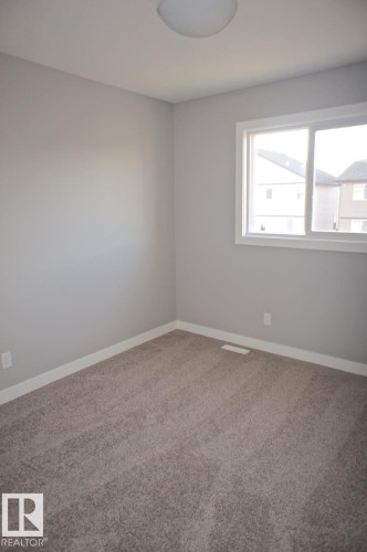 180 Radcliffe Wynd, Fort Saskatchewan, AB - Indoor Photo Showing Other Room