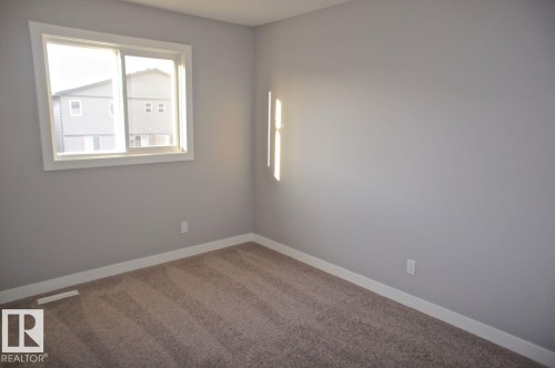 180 Radcliffe Wynd, Fort Saskatchewan, AB - Indoor Photo Showing Other Room