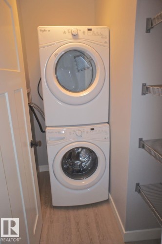 180 Radcliffe Wynd, Fort Saskatchewan, AB - Indoor Photo Showing Laundry Room