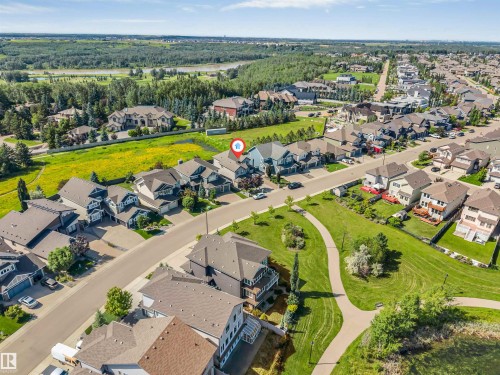 Aerial perspective showcasing a residential neighborhood with varied architectural styles - 656 180 Street Sw, Edmonton, AB - Outdoor With View