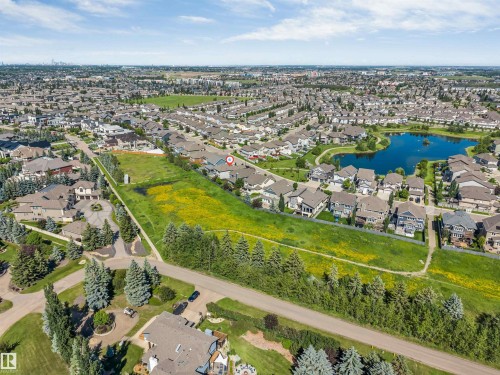 Aerial perspective showcasing an established neighborhood with varied housing styles - 656 180 Street Sw, Edmonton, AB - Outdoor With View