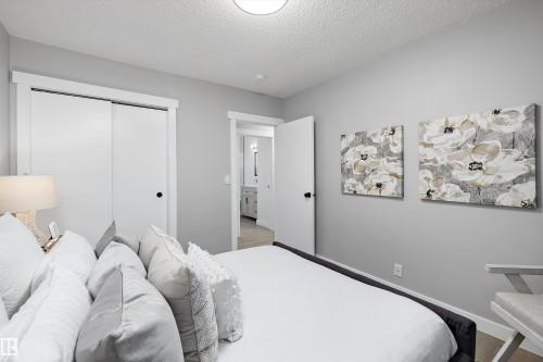 Light gray walls complement white trim and doors - 12912 103 Street, Edmonton, AB 