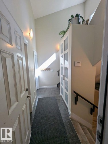 Entryway featuring a vaulted ceiling and tile flooring - 2327 Frezenberg Avenue, Edmonton, AB 
