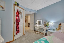 Neutral-toned carpeting paired with light blue walls - 