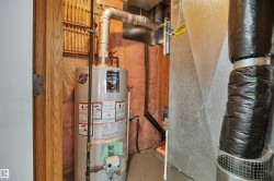 Water heater installation featuring, insulated walls, and metal ductwork - 