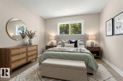 The virtual staging emphasizes the room's clean lines and natural light from the window while creating a serene, uncluttered atmosphere; thoughtful furniture placement help buyers envision this as their own restful sanctuary - 