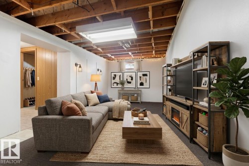 The virtual staged layout emphasizes the room's generous proportions and multiple possibilities, helping buyers envision it as their family's favorite gathering spot - 10602 100 Avenue, Fort Saskatchewan, AB - Indoor