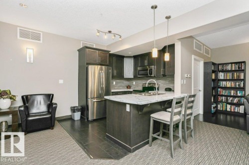 256 6079 Maynard Way, Edmonton, AB - Indoor Photo Showing Kitchen With Stainless Steel Kitchen With Upgraded Kitchen