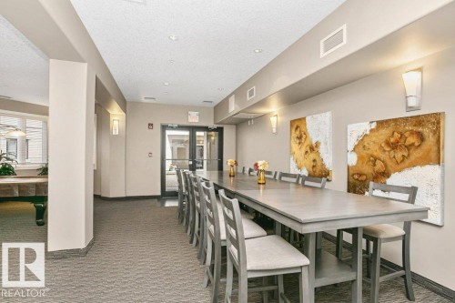 256 6079 Maynard Way, Edmonton, AB - Indoor Photo Showing Dining Room