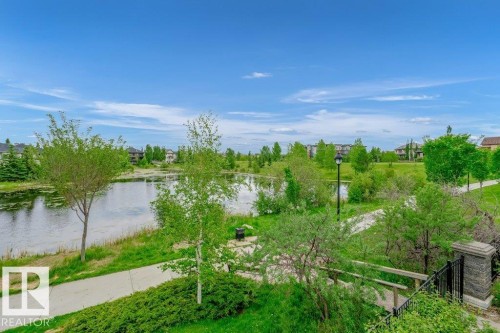 256 6079 Maynard Way, Edmonton, AB - Outdoor With Body Of Water With View