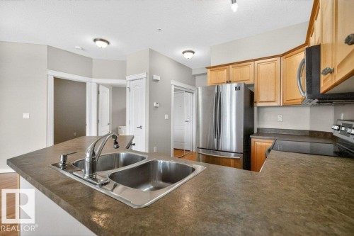 360 2750 55 Street, Edmonton, AB - Indoor Photo Showing Kitchen With Double Sink