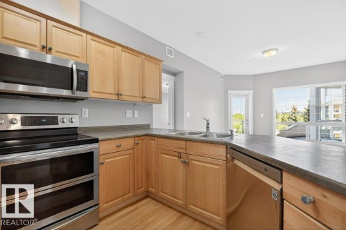360 2750 55 Street, Edmonton, AB - Indoor Photo Showing Kitchen With Double Sink