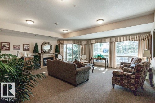 360 2750 55 Street, Edmonton, AB - Indoor Photo Showing Living Room With Fireplace