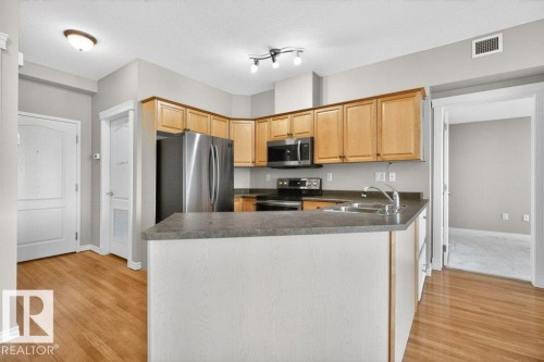 360 2750 55 Street, Edmonton, AB - Indoor Photo Showing Kitchen With Double Sink