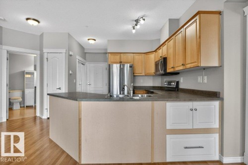 360 2750 55 Street, Edmonton, AB - Indoor Photo Showing Kitchen With Double Sink