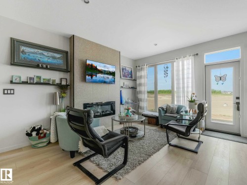 157 Garneau Gate, Spruce Grove, AB - Indoor Photo Showing Living Room With Fireplace
