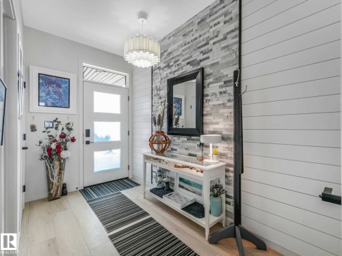 157 Garneau Gate, Spruce Grove, AB - Indoor Photo Showing Other Room With Fireplace
