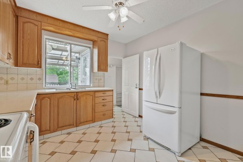 9727 69 Avenue, Edmonton, AB - Indoor Photo Showing Kitchen With Double Sink