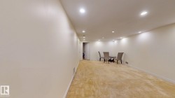 Spacious room with recessed ceiling lighting, light-toned carpeting, and neutral wall finishes - 