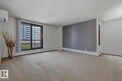 Spacious room featuring carpet flooring and white walls - 