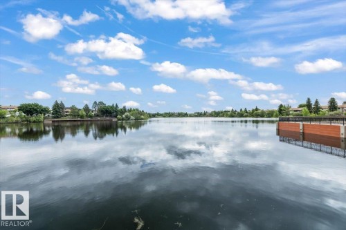 Expansive water feature with a contemporary pier structure - 427 15499 Castle Downs Road, Edmonton, AB 