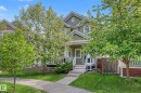 Two-story home with light green siding and white trim - 2007 72 Street, Edmonton, AB  - Outdoor 