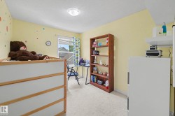 Light-colored walls and carpeting create a bright interior - 