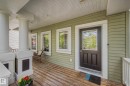 Covered porch with wood-finish flooring - 2007 72 Street, Edmonton, AB  - Outdoor With Deck Patio Veranda With Exterior 