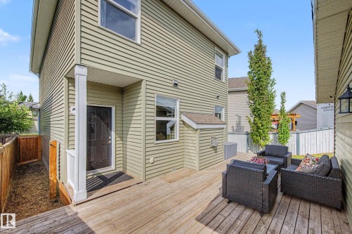 Outdoor wood-finish deck with a patio area and direct access to the property's exterior - 2007 72 Street, Edmonton, AB - Outdoor With Deck Patio Veranda With Exterior