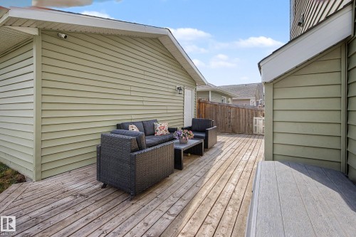 Expansive wood-finish deck with composite board accents - 2007 72 Street, Edmonton, AB - Outdoor With Deck Patio Veranda With Exterior