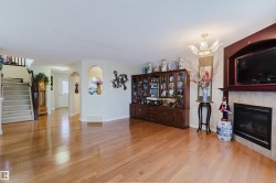 Hardwood flooring throughout the main living area - 