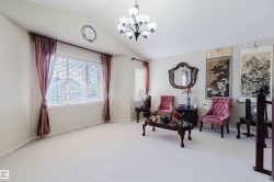 Vaulted ceiling with an overhead chandelier - 