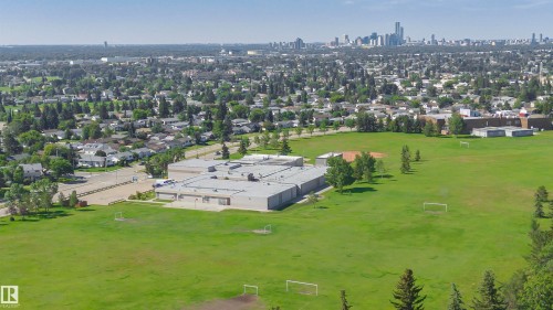 Expansive green space featuring athletic fields and mature trees - 5418 144B Avenue, Edmonton, AB 