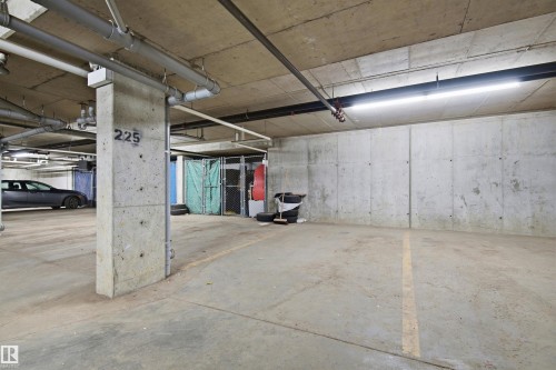 Concrete flooring with a painted parking line - 435 5515 7 Avenue, Edmonton, AB 